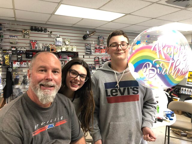 The Pro Cycle team behind the parts counter